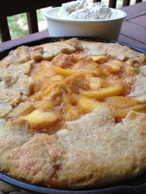 Rustic Peach Pie -- It has all the soft, peachy deliciousness you crave in a rustic, almond crust in a cast iron skillet which just adds charm to the drool-worthiness. | thatwhichnourishes.com
