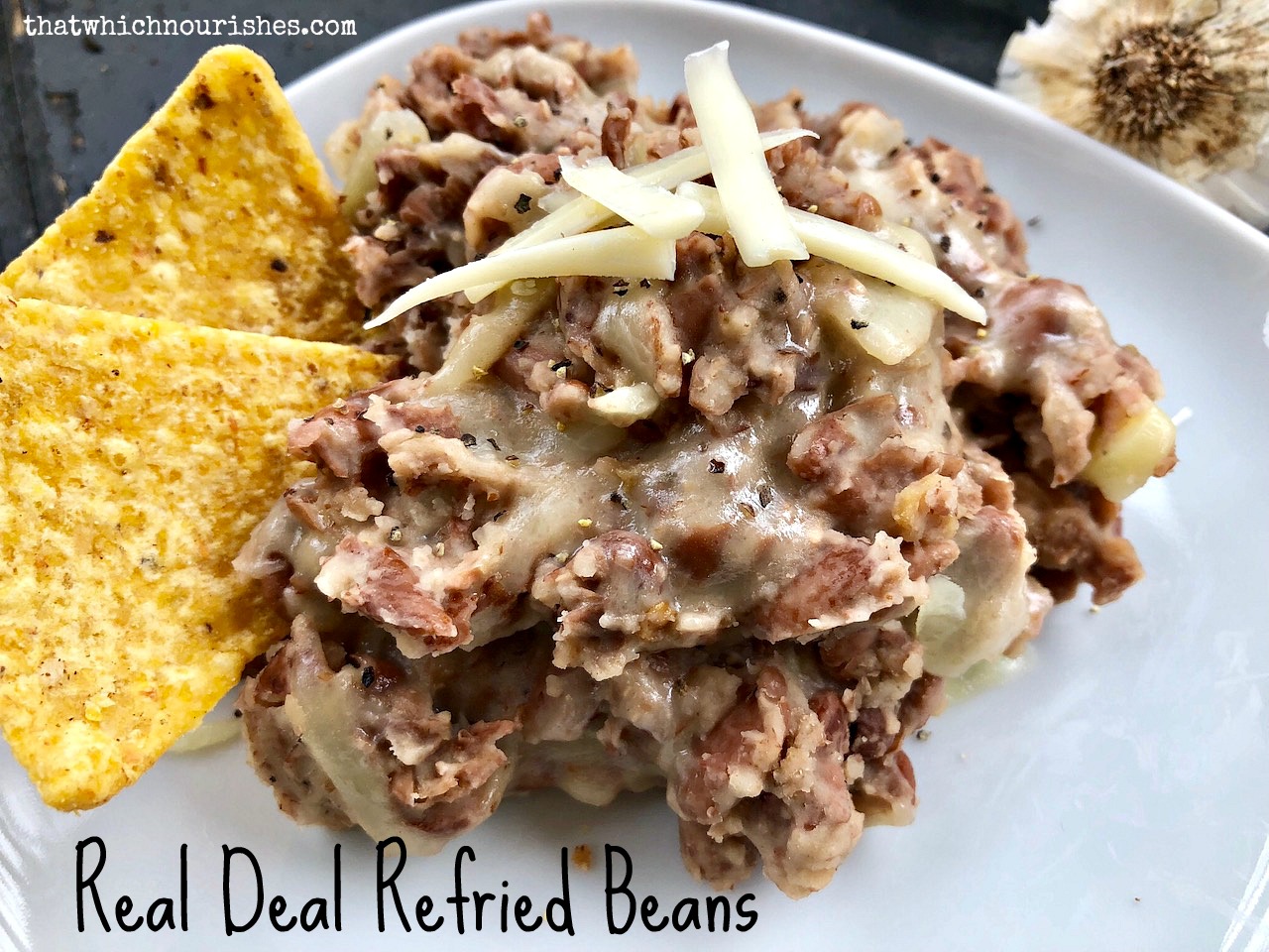 Real Deal Refried Beans -- Real-deal because they are cooked from scratch and flavored with garlic, onions, butter, and bacon to make the thickest, heartiest, most flavorful beans you may have had to date. | thatwhichnourishes.com