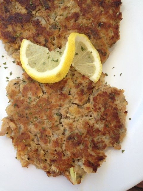 Salmon Patties -- Canned salmon transforms into a crispy, flavorful patty of yum with just a little help from this great recipe. An easy way to sneak salmon into your family's meals in a way they will love. | thatwhichnourishes.com
