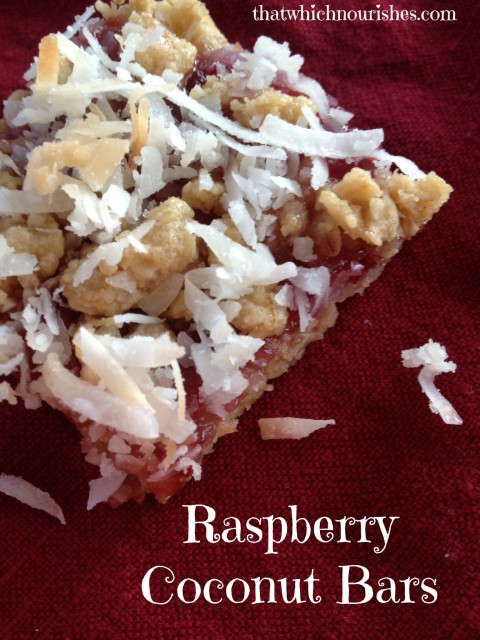 Raspberry Coconut Bars -- A shortbread-like crust containing oats and toasted coconut is blanketed with raspberries and more coconut to make a bar of yum that is unique and fruity. | thatwhichnourishes.com