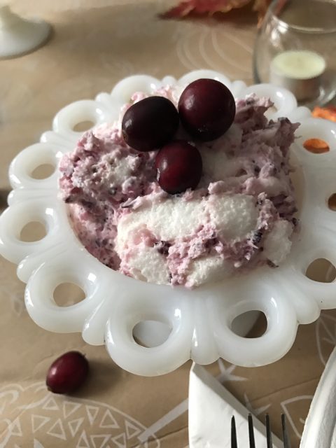Cranberry Cheesecake Fluff -- Marshmallows, bits of tart cranberries, and pineapple nestled in a fluffy pile of cream cheese and homemade whipped cream. | thatwhichnourishes.com