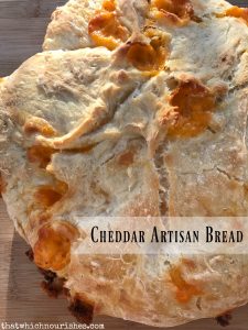 Cheddar Artisan Bread -- Crispy on the outside, soft on the inside, this Cheddar Artisan Bread may be the easiest most amazing bread you've ever had. No kneading needed! |thatwhichnourishes.com
