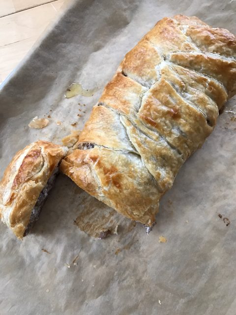 Cheesy Sausage Breakfast Braid -- Creamy cheese and savory sausage meet inside a flaky, buttery pastry to make a simple, yet spectacular breakfast, brunch, or appetizer showstopper. | thatwhichnourishes.com
