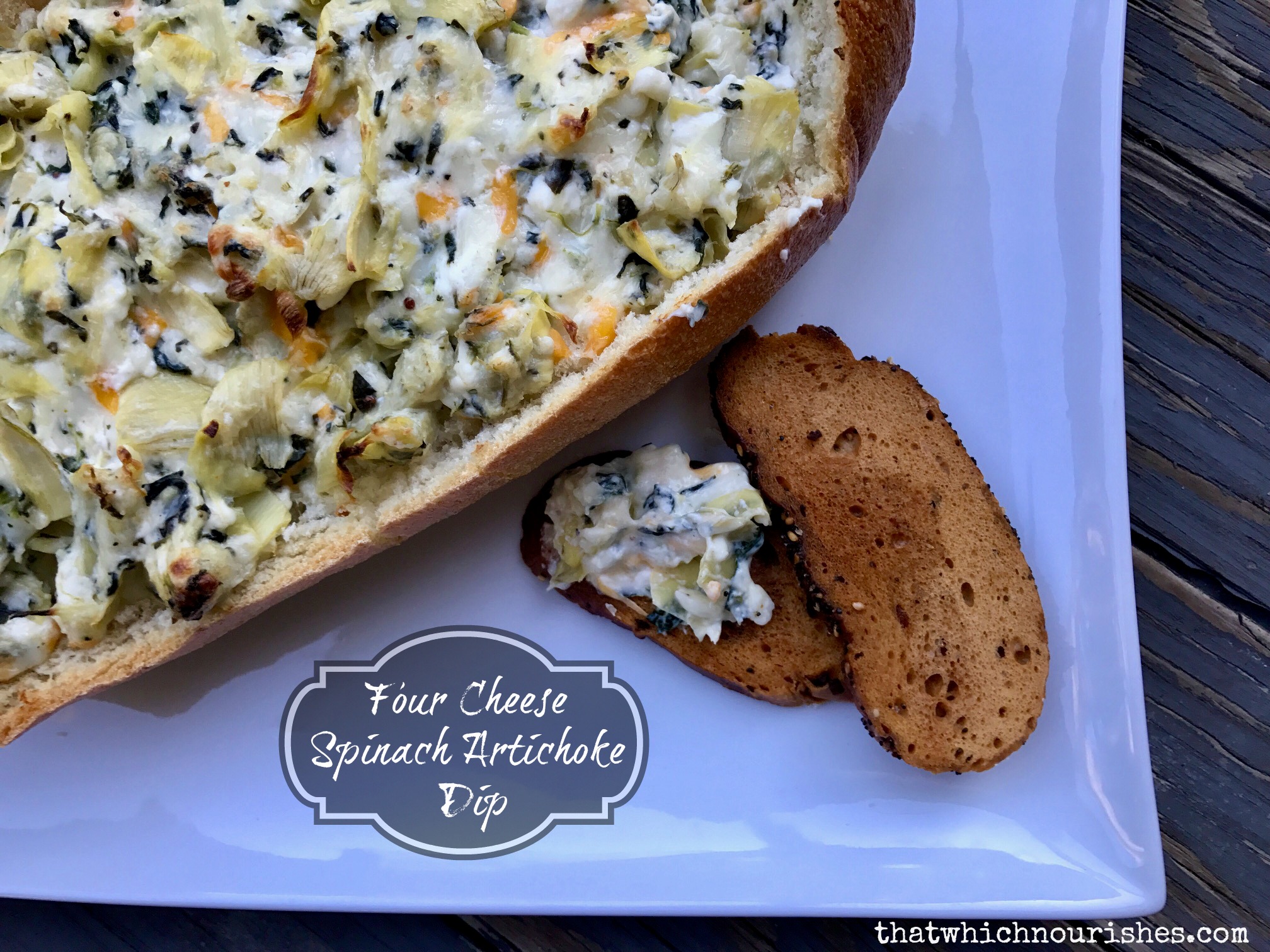 Four Spinach Artichoke Dip == Four cheeses combine perfectly with garlic, spinach, and artichokes to create the very best version of this classic dip we all love. Bake it in a bread bowl for ultimate dipping pleasure. | thatwhichnourishes.com