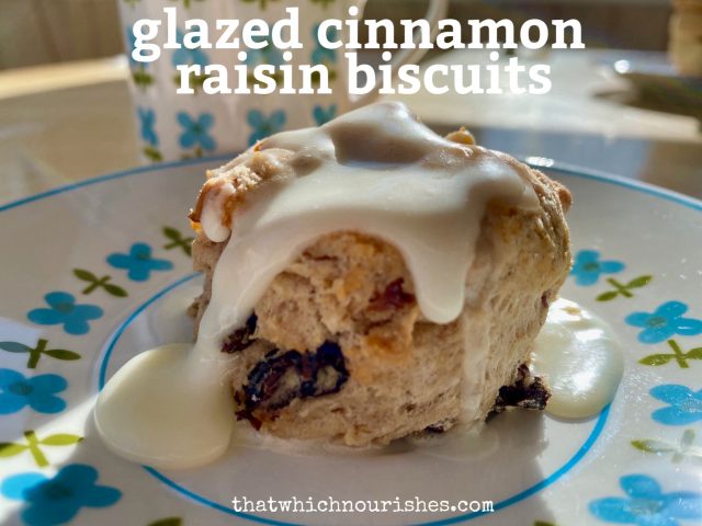 Glazed Cinnamon Raisin Biscuits -- Tender, flaky, buttery biscuits made from scratch, studded with plump raisins, and flavored with cinnamon -- finished off with a drizzle of sweetness. | thatwhichnourishes.com