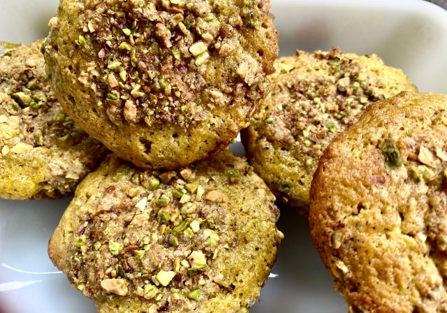 Pistachio Crunch Muffins -- Sweetened with maple syrup, these pleasantly pistachioed, soft muffins made from scratch are crowned with a buttery, streusel topping. | thatwhichnourishes.com