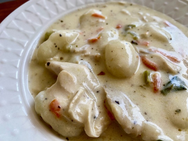 Creamy Chicken and Gnocchi Soup -- When you want ultimate comfort food, you can have it easily with a bowl of creamy chicken soup with tender bites of gnocchi made quickly and easily from scratch! | thatwhichnourishes.com