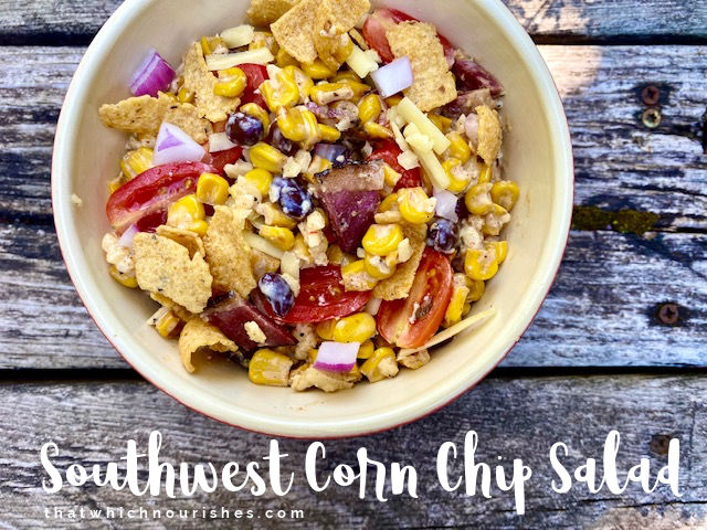 Southwest Corn Chip Salad -- Fresh and flavorful, this salad is bursting with southwestern veggies and seasonings making a unique and delicious salad with charred corn as the main ingredient and crunchy corn chips as the fun! | thatwhichnourishes.com