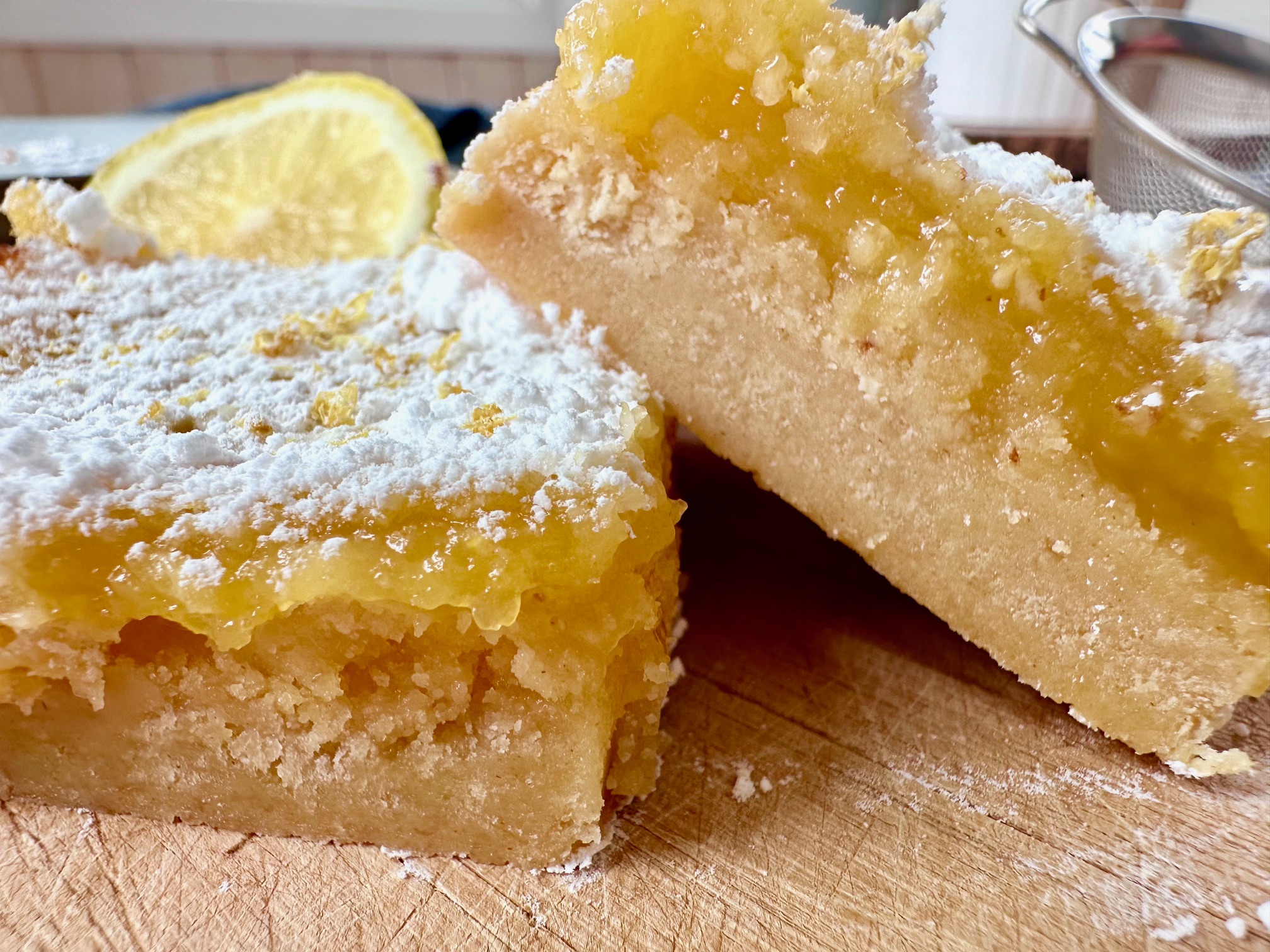 Luscious Lemon Bars -- These lemon bars have a shortbread crust, a tart, creamy center, and a pile of soft, sweet sugar on top -- just how a lemon dessert should taste. | thatwhichnourishes.com